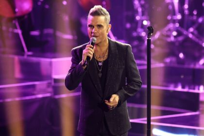 Robbie Williams fotoshoot gia to neo album Britpop