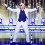 Pitbull on stage at Hyde Park during Guinness World Record bald caps attempt